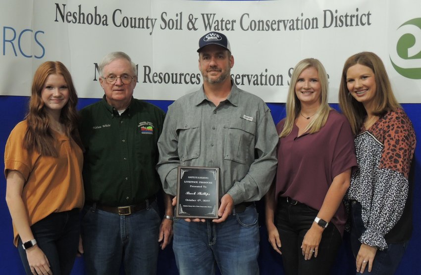 Outstanding Livestock Producer was Brock Phillips (pictured with his family and Neshoba SWCD Chairman Nelson White)